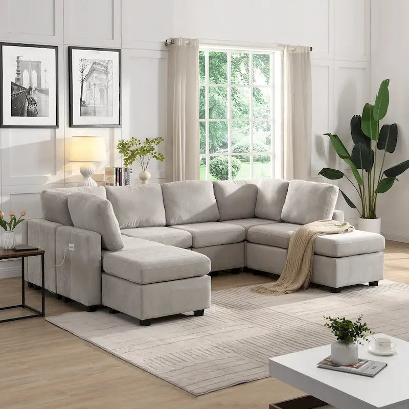 Canapé d'angle 103 places avec deux poufs mobiles et trois ports USB