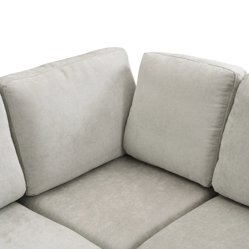 Canapé d'angle 103 places avec deux poufs mobiles et trois ports USB
