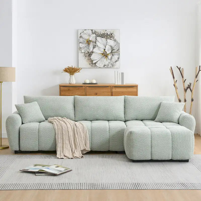 100 divani a L in tessuto bouclé con pouf mobile