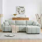 100 divani a L in tessuto bouclé con pouf mobile