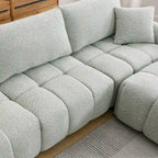 100 divani a L in tessuto bouclé con pouf mobile