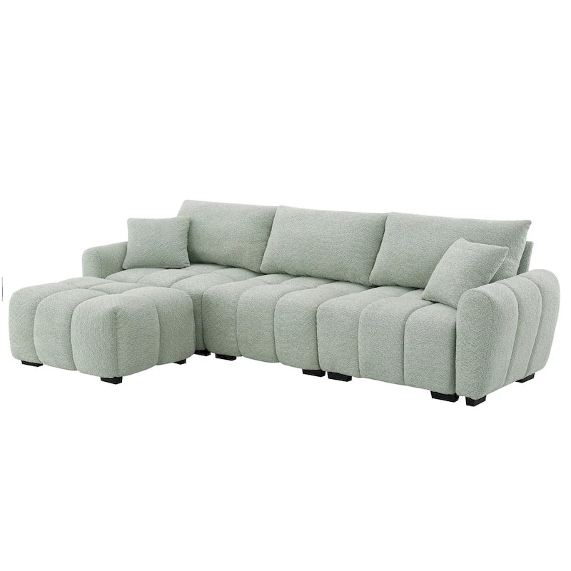 100 divani a L in tessuto bouclé con pouf mobile