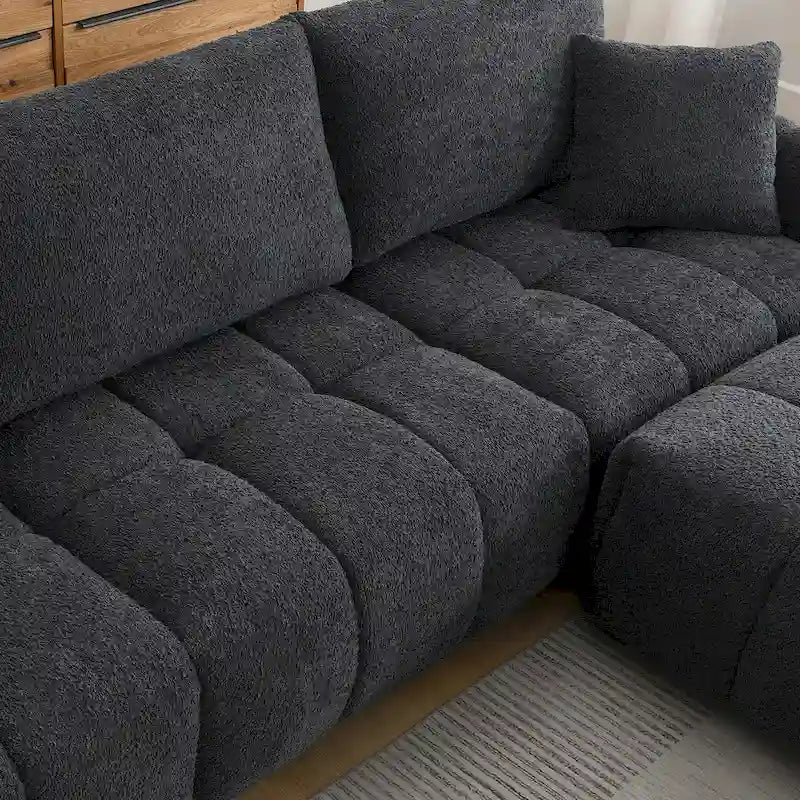 100 divani a L in tessuto bouclé con pouf mobile