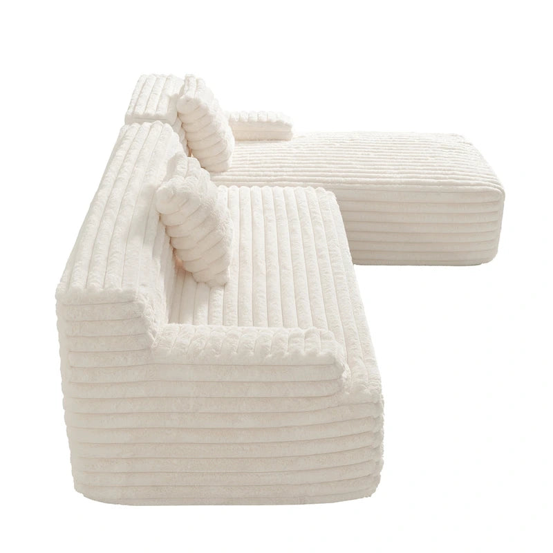 Divano componibile a L con penisola, 3 posti, modello "Faux Fur Cloud 110", con due cuscini decorativi inclusi