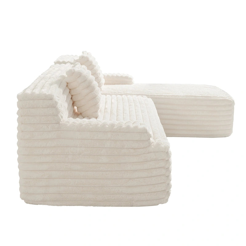 Divano componibile a L con penisola, 3 posti, modello "Faux Fur Cloud 110", con due cuscini decorativi inclusi