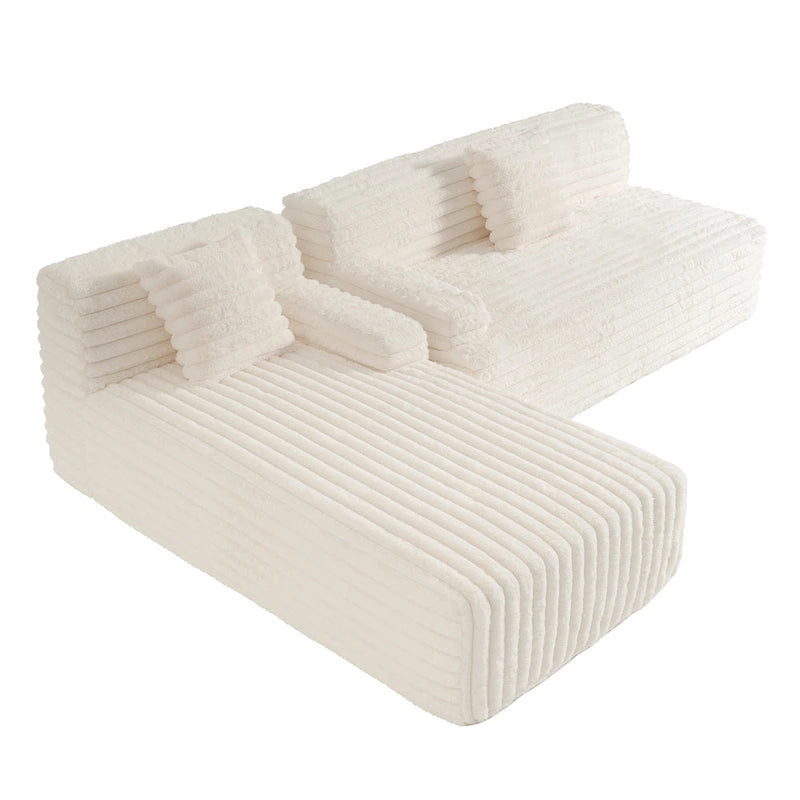 Divano componibile a L con penisola, 3 posti, modello "Faux Fur Cloud 110", con due cuscini decorativi inclusi