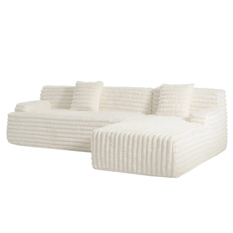 Divano componibile a L con penisola, 3 posti, modello "Faux Fur Cloud 110", con due cuscini decorativi inclusi
