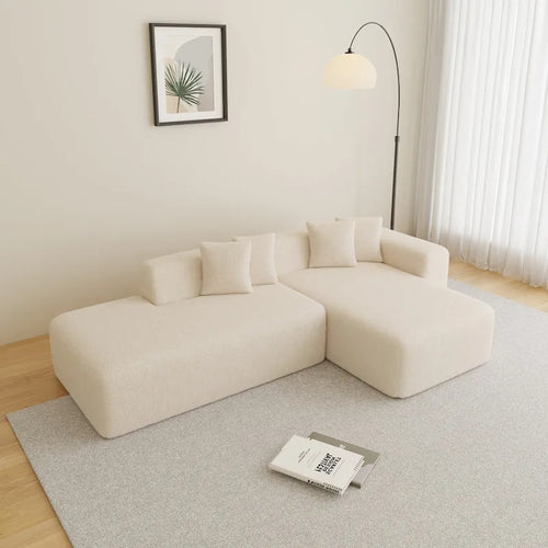 105.51 Divano componibile moderno a L con 5 posti e chaise longue, in morbido tessuto Sherpa "lana d'agnello"