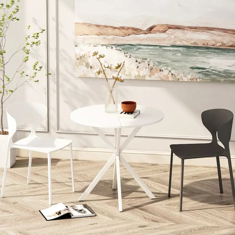 Tavolo da pranzo rotondo moderno con gambe incrociate, piano rimovibile in due pezzi