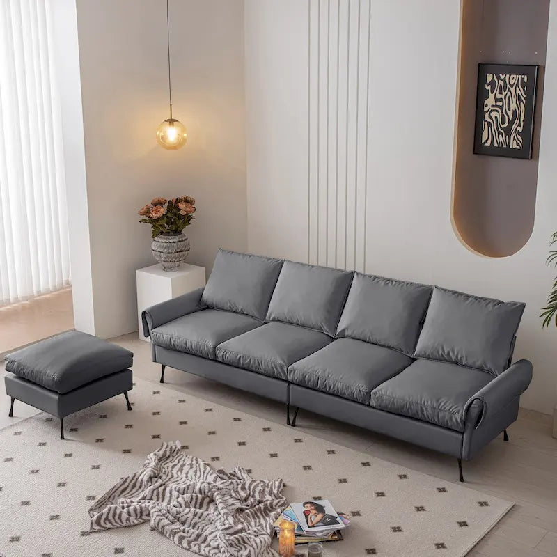 Divano moderno a L da 104,5 pollici con rivestimento in pelle tecnica e pouf convertibile, grigio scuro