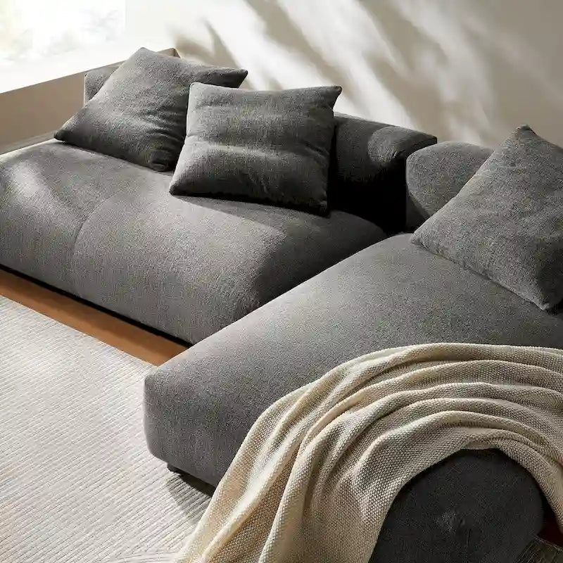 Divano componibile a 2 pezzi Solace in tessuto imbottito con chaise longue